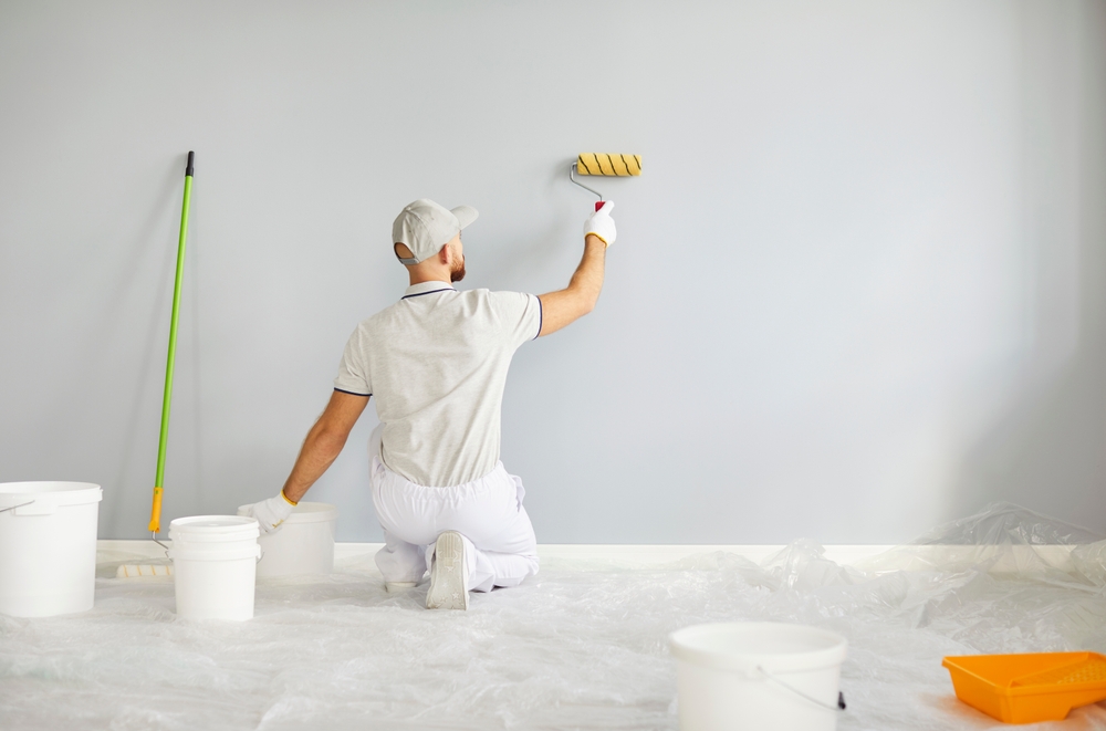 professional,service,,working,painter,,construction,man,worker,,wearing,uniform,painting